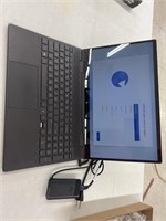 HP 15.5" Laptop (powers on)(cracked screen)