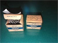 Two boxes of vintage paper clamps