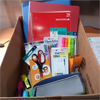 Box of mixed school supplies