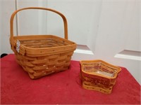 Two longaberger baskets both have liners