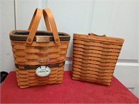 Two longaberger baskets one has liner