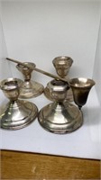 Group of sterling weighted candlestick holders