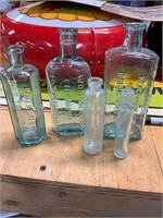 Five miscellaneous bottles