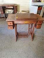 OLD SINGER SEWING MACHINE AND CABINET