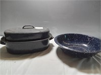 One dark blue vintage enamel roasting pan with