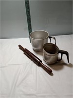 2 vintage sifters with rolling pin