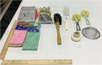 Cleaning lot w/ sponges & scrub brushes