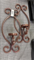 Two cast-iron sconces/candle holders