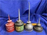 Four Small Oil Cans