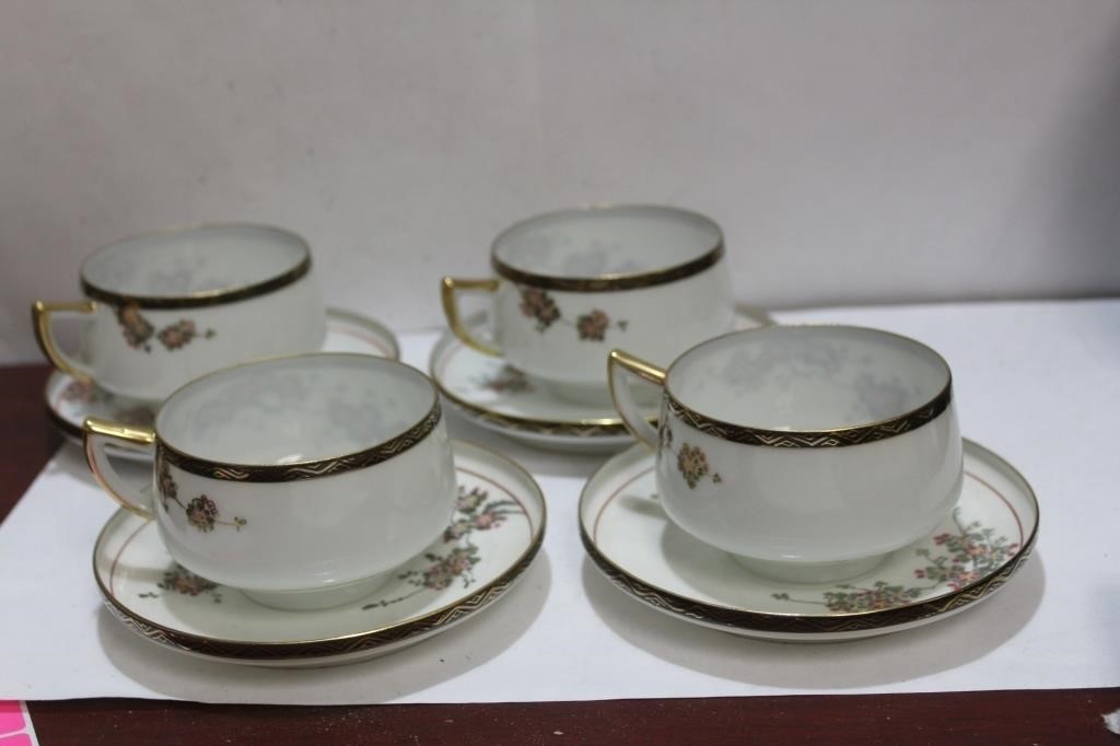 Four Sets of Signed Kutani Cups and Saucer Sets