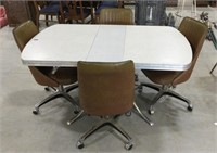 Metal table w/ 4 chairs 59x36x29.5 - bottom is