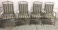 Set of four folding patio chairs