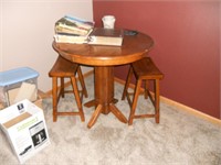 Small rd. table w/ w chairs.