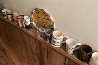 Collection of beer steins in stairwell