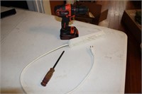 Cordless drill, surge protector, screwdriver
