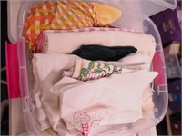 Container of vintage linens including lap robe,