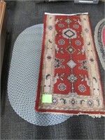 2 Rugs Both ~5’ Long. End of One Taped.