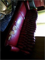Very retro and vintage red leather couch and