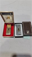 2 vintage win gas lighters in cases