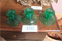 lot of green glass candle holdes