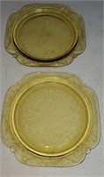 Pair of yellow depression glass plates