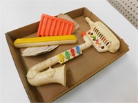4 plastic musical instruments