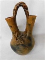 Brown flower vase with handle and double sides