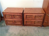 Matching bedside stands, both have holes in the