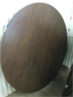 5 foot round table with folding legs.  Heavy