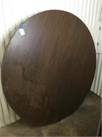 5 foot round table with folding legs.  Heavy