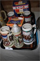 9PC COLLECTION OF BEER STINES AND TRAYS