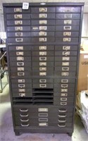 Large steel cabinet with lots of storage drawers