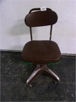 Older swivel security office chair/shop chair