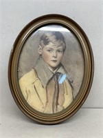 Oval frame picture of little boy