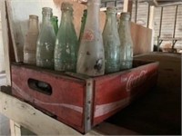 Coca Cola crate with bottles