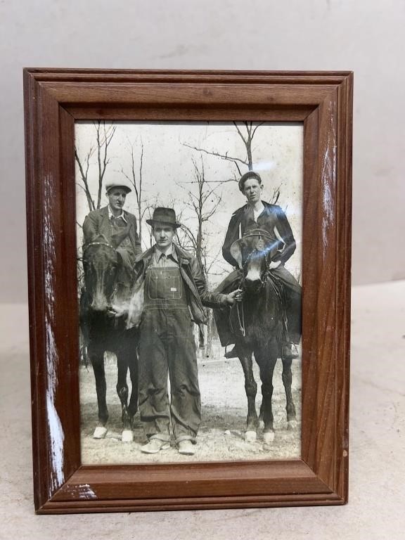 Early photo of man with horses