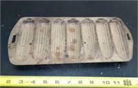 Cast iron 7 row cornbread pan stamped 27 C