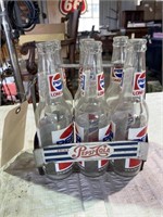 (6) Pepsi bottles w/ metal 6-pack carrier