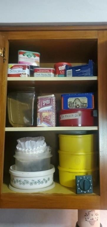 Shelf lot of Tupperware,  tins, and coffee