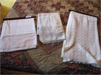 Table linens and cable knit throw
