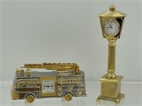 2 Miniature brass clocks, one firetruck and one
