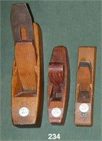 Three wooden smooth planes