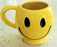 Smiley face, bright yellow coffee mug
