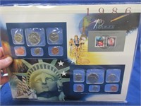 1986 uncirculated mint coins & stamp sets
