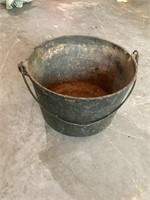 Three legged cast-iron pot