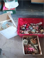 Three boxes of assorted Christmas decor and