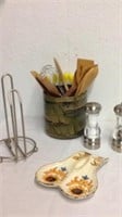 Kitchen utensils in caddy with the spoon rest