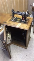 Antique Minnesota model H treadle sewing machines