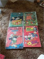 Lot of 4 Disney comics 1949 to 1969