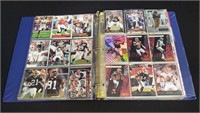 Binder of Browns and Buccaneers football cards